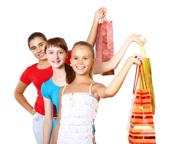 Pretty teenage girls with shopping bags — Stock Photo, Image