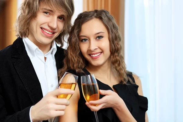 Couple in a restaurant with shampagne — Stock Photo, Image