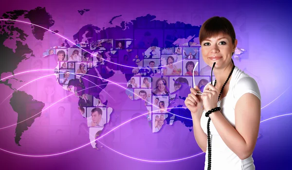 Young woman against world map background — Stock Photo, Image