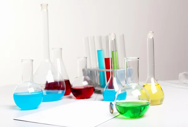 Chemistry laboratory equipment and glass tubes — Stock Photo, Image