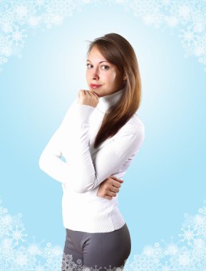 Young girl in white sweater