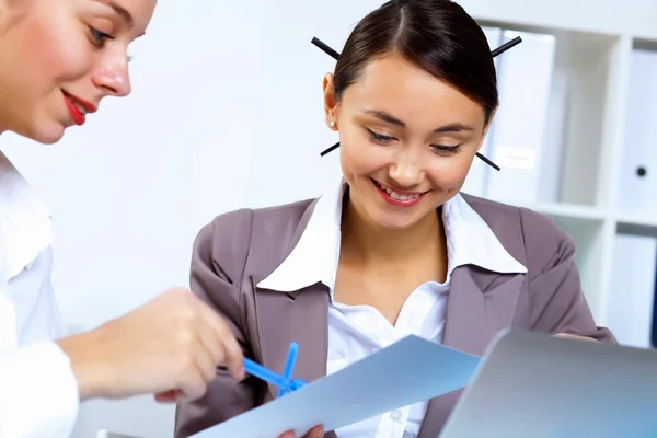 Young women in business wear working in office — Stock Photo, Image