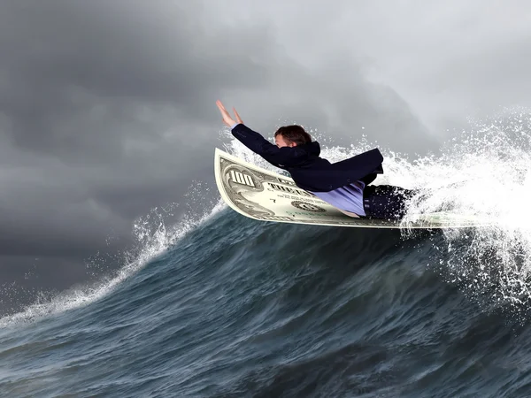 Podnikatel surfování na vlnách moře — Stock fotografie