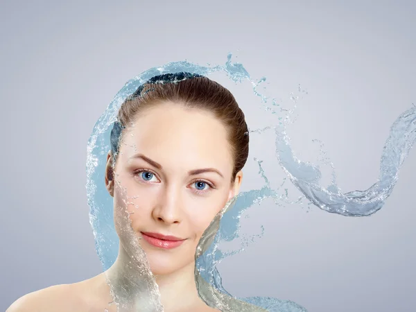 stock image Young woman with water splashes