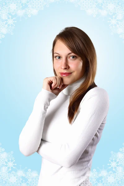 Young girl in white sweater — Stockfoto