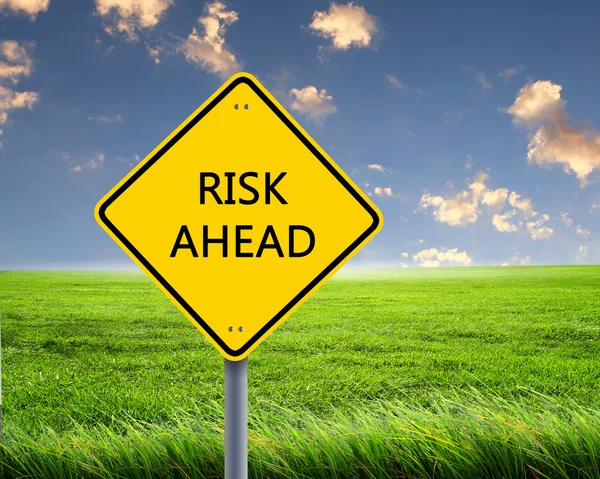 stock image Road sign warning about risk ahead