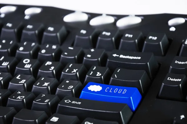 Комп'ютерна клавіатура з символом плаща — стокове фото