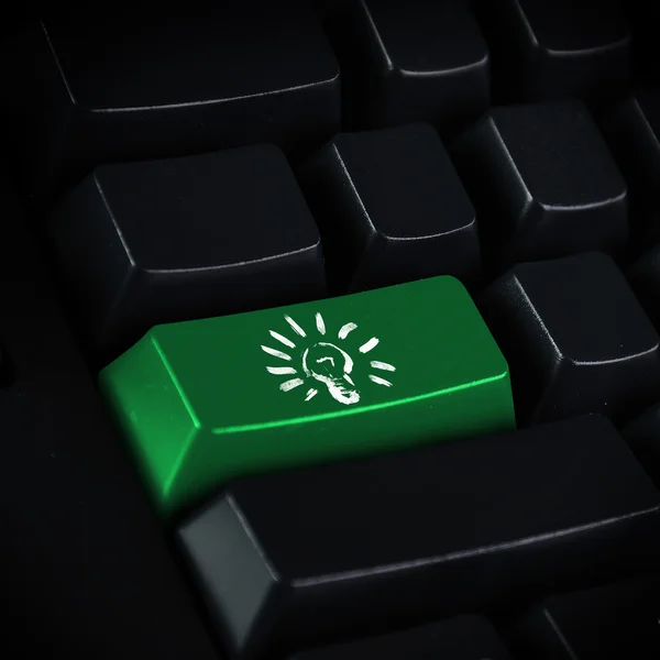 Bilgisayar klavye ve ampul simgesi — Stok fotoğraf