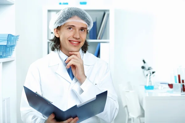 Young doctor in white uniform — Stock Photo, Image