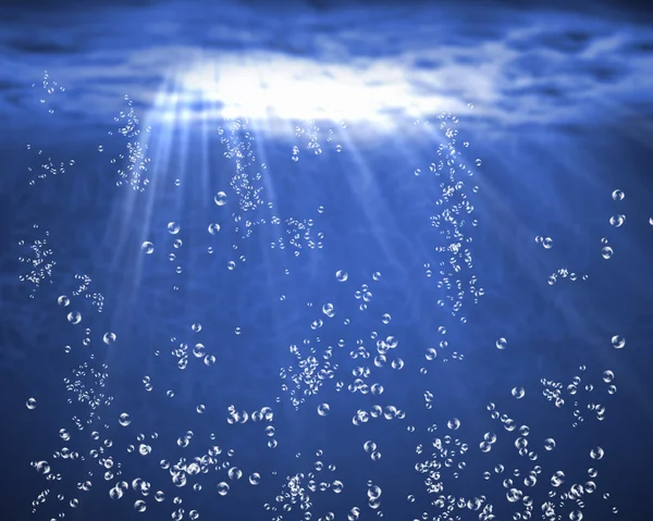 Синє море під водою з повітряними бульбашками — стокове фото
