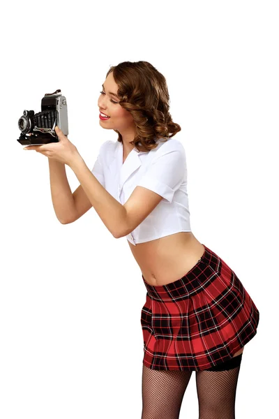 Woman dressed in retro style with camera — Stock Photo, Image