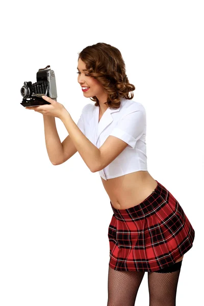 Mulher vestida em estilo retro com câmera — Fotografia de Stock
