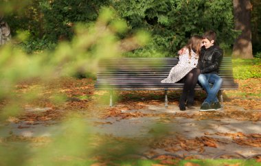 Romantic couple in the Luxembourg garden at fall. Paris, France clipart