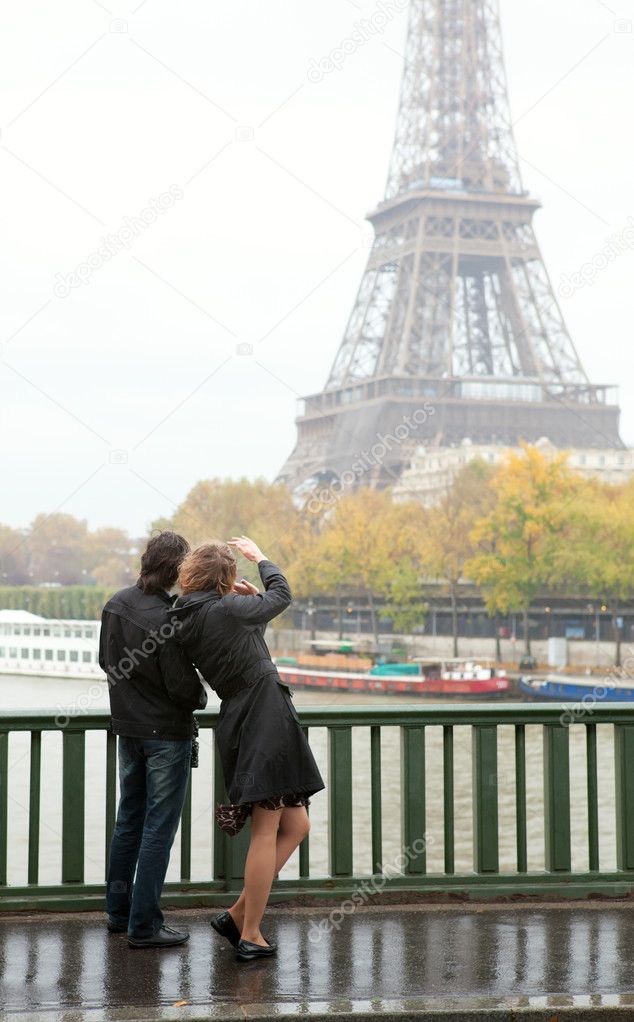 Couple in Paris at rainy weather