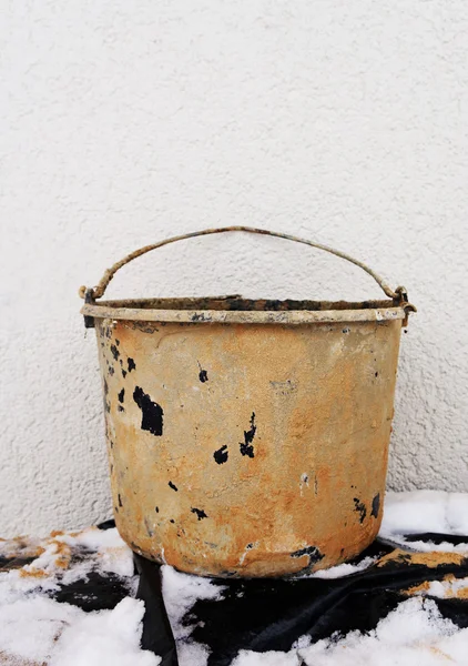 stock image Bucket and wall.