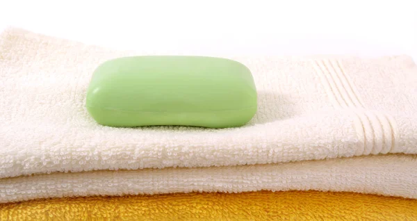 stock image Green soap and towels.