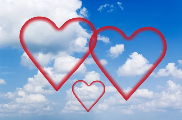 Fluffy clouds and hearts. — Stock Photo, Image