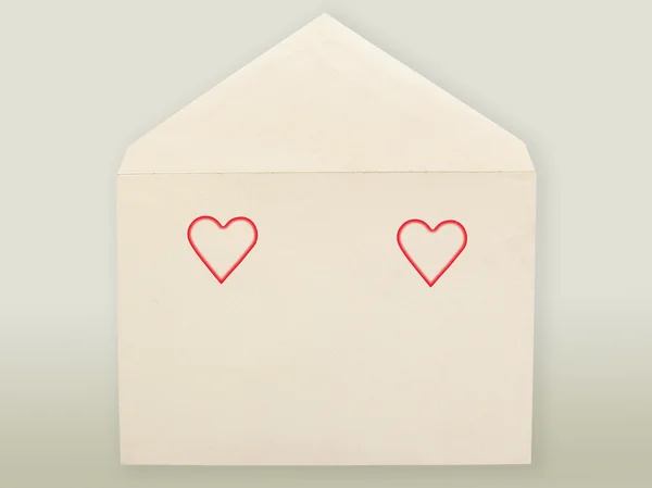 Old envelope and hearts. — Stock Photo, Image