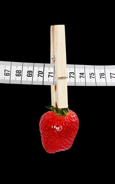 Strawberry and clothespin. — Stock Photo, Image