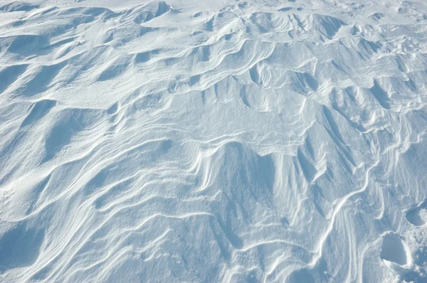 Hermosa textura de nieve con olas — Foto de Stock