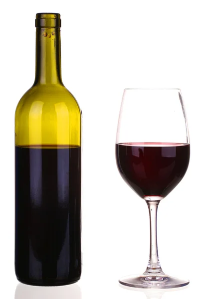 Clear glass and a bottle of red wine — Stock Photo, Image