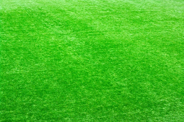 Тканево-зелёный газон — стоковое фото