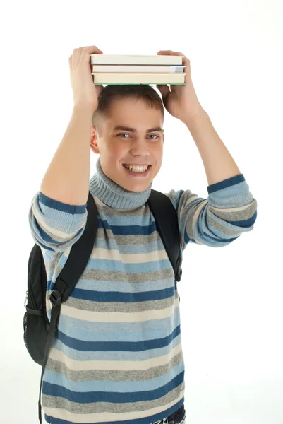 Portrét studenta s knihami na hlavu — Stock fotografie