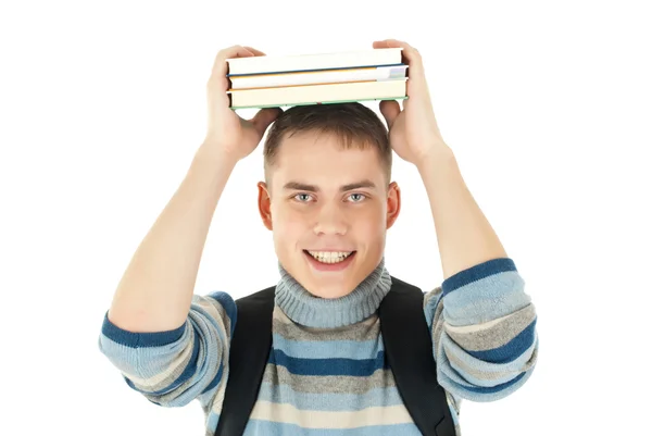 Porträtt av student med boken på huvudet — Stockfoto