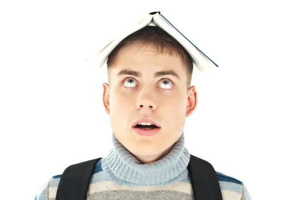 Πορτρέτο του μαθητή με το βιβλίο στο κεφάλι του — Φωτογραφία Αρχείου