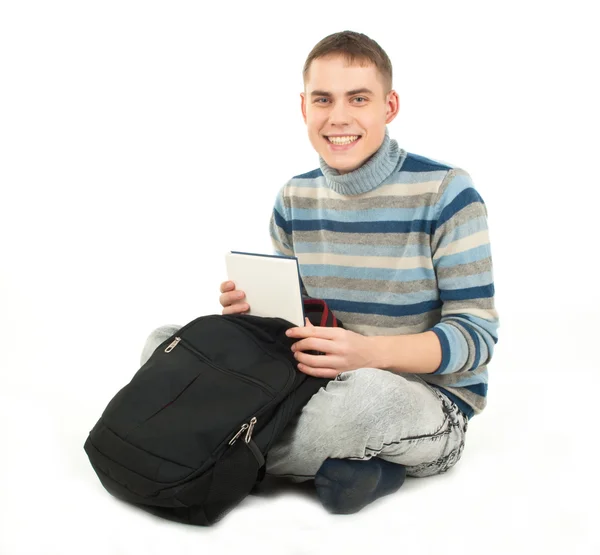 Jonge gelukkig mannelijke student met rugzak — Stockfoto