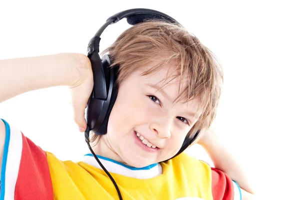 快乐的十几岁的男孩用耳机的肖像 — 图库照片