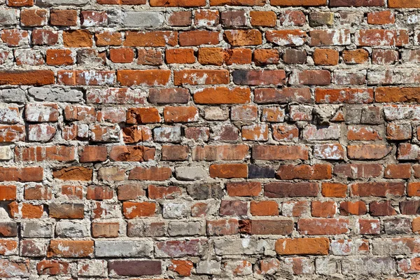 Old dirty red brick wall as background — Stock Photo, Image