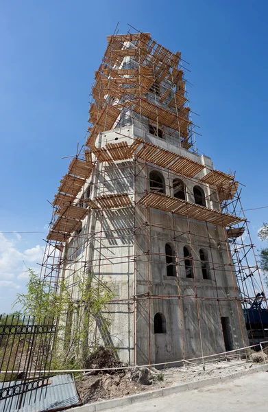 stock image Tower building under construction over blue sky background