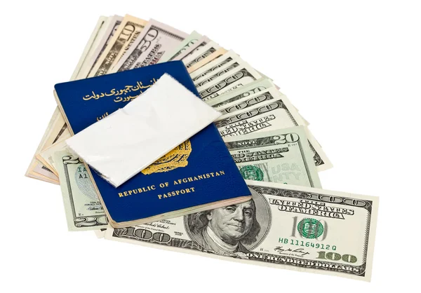 Package with drug over the Afghan passport and U.S. dollars — Stock Photo, Image