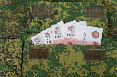 Banknotes in the military uniform pocket clipart