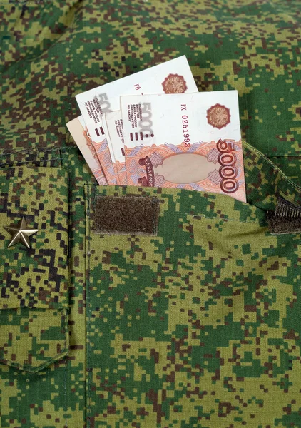 Banknotes in the military uniform pocket — Stock Photo, Image