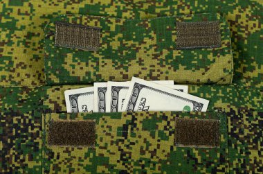 Banknotes in the military uniform pocket clipart