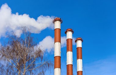 Lots of smoking chimneys other blue sky clipart