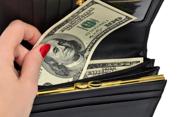 Billete de cien dólares en un bolso negro — Foto de Stock