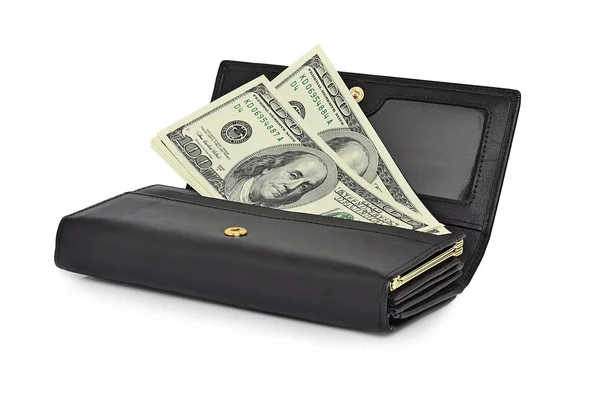 Billetes de dólar en un bolso negro . — Foto de Stock