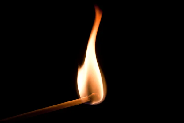 Burning match Stockbild