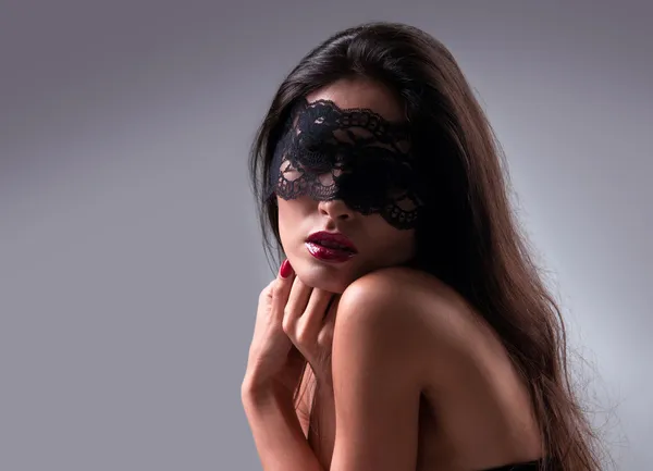 Portrait of a girl in a mask — Stock Photo, Image