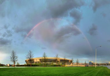 Donbass Arena stadium in the spring of 2012 with a rainbow clipart