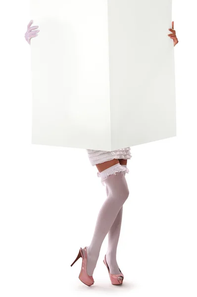 Girl holding a large sheet of paper — Stock Photo, Image