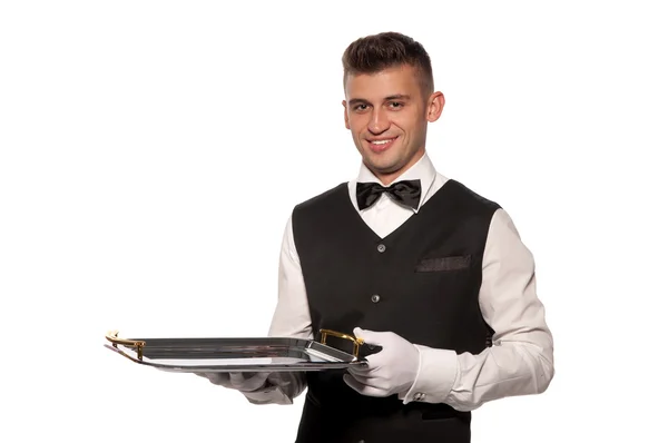 Молодий хлопчик офіціант з підносом — стокове фото