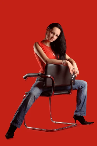 Frau auf dem Stuhl — Stockfoto