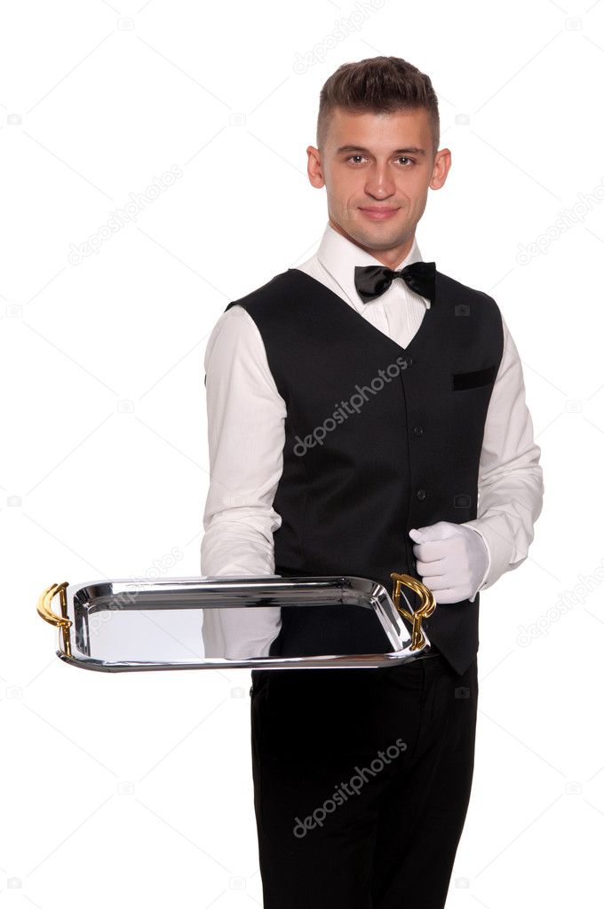 a young boy waiter with a tray