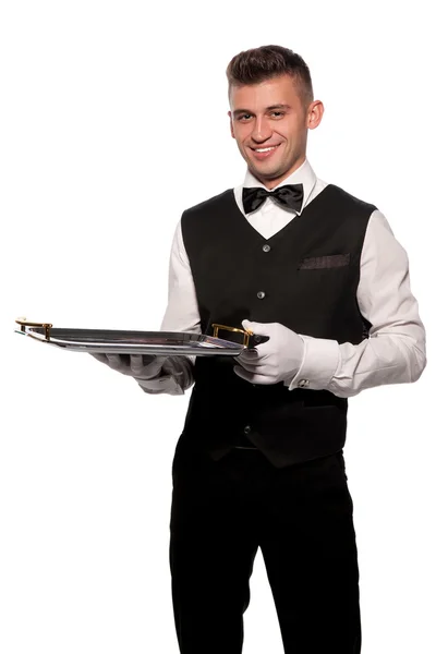Un joven camarero con una bandeja —  Fotos de Stock