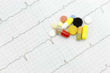 Medicines and lines of the cardiogram of heart clipart
