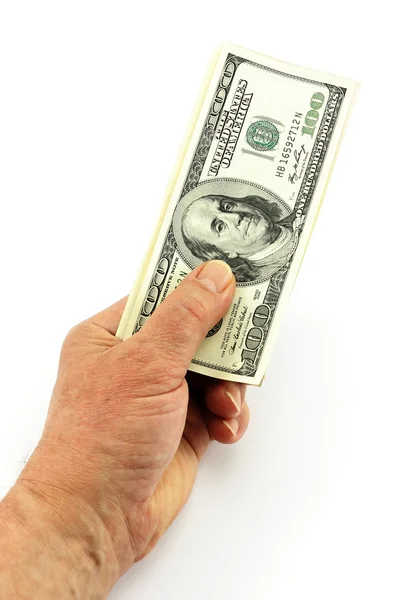 Доллары в руке — стоковое фото